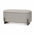Banco de almacenamiento de tela beige con patas de madera